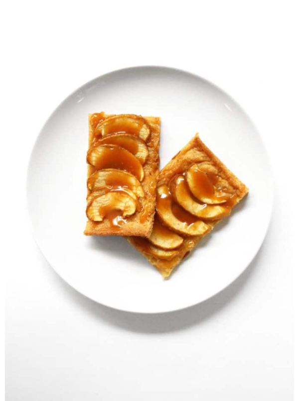 Two slices of Miss Jones Caramel Apple Bars on a plate