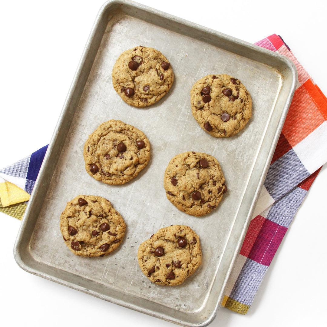 four of Miss Jones Baking Organic Chocolate Cookies on baking pan